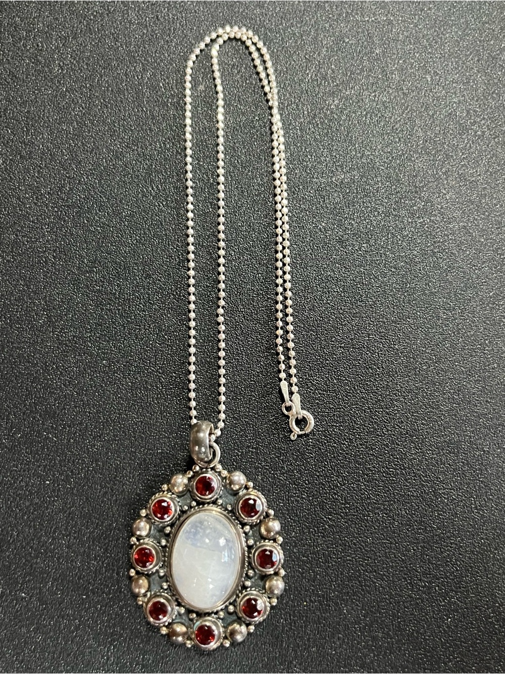 Sterling Silver Moonstone Pendant Necklace with Red Garnet Accents. 925